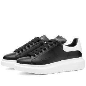 Black & White Heel Tab Sneaker with Wedge Sole by Alexander McQueen