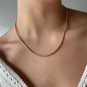 Gold Flat Beaded Necklace by JANA