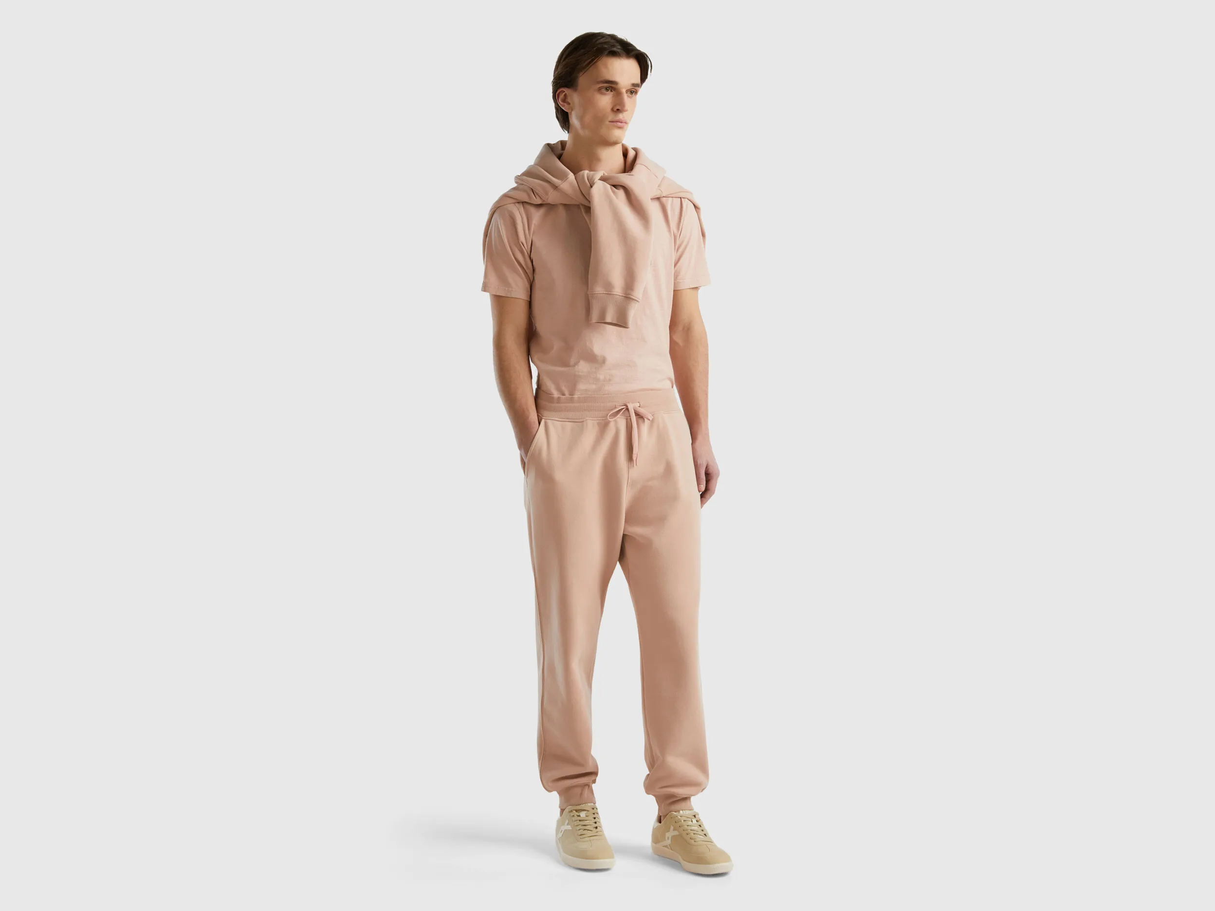 Joggers in organic cotton blend - Nude | Benetton