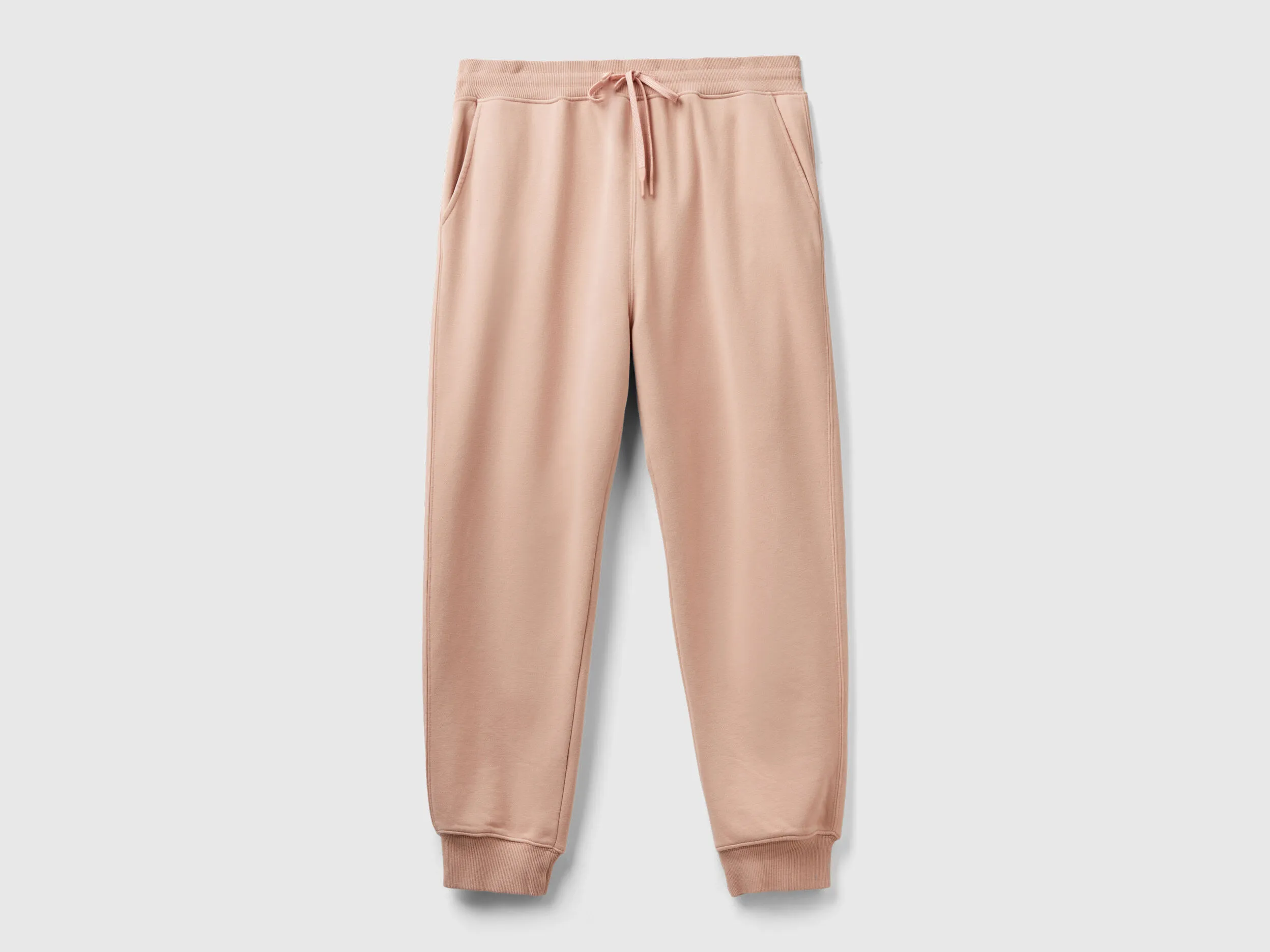 Joggers in organic cotton blend - Nude | Benetton