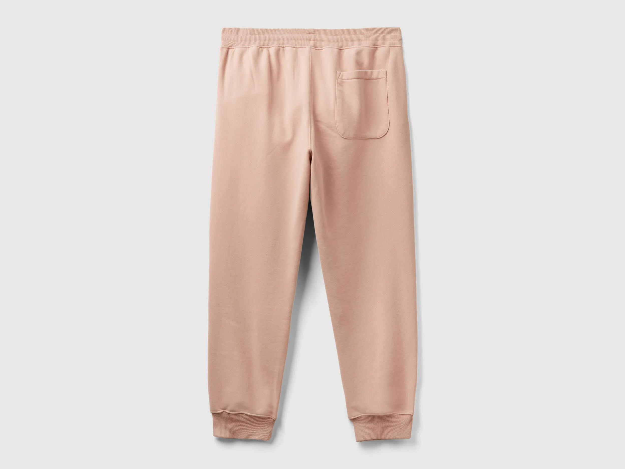 Joggers in organic cotton blend - Nude | Benetton