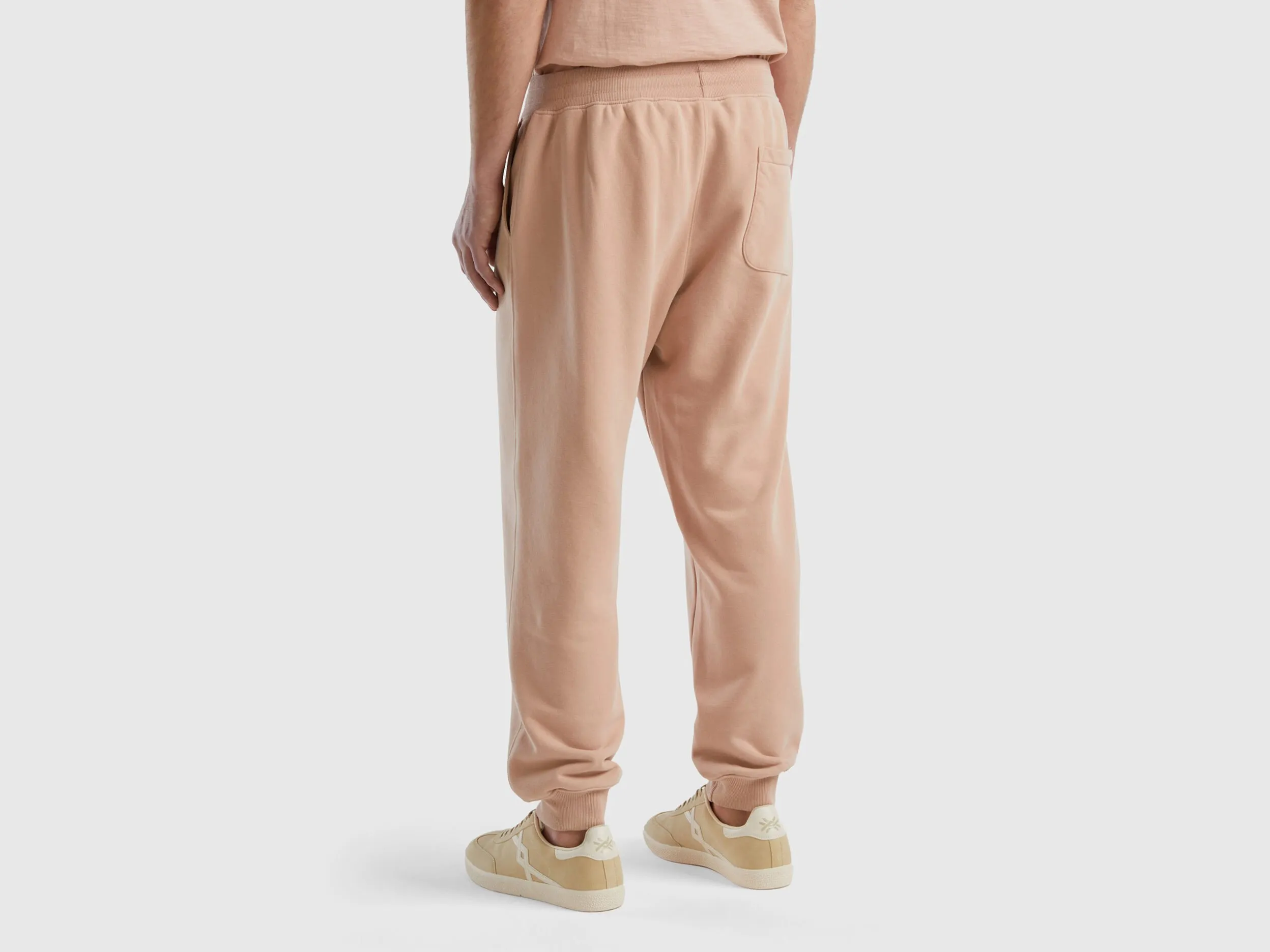 Joggers in organic cotton blend - Nude | Benetton